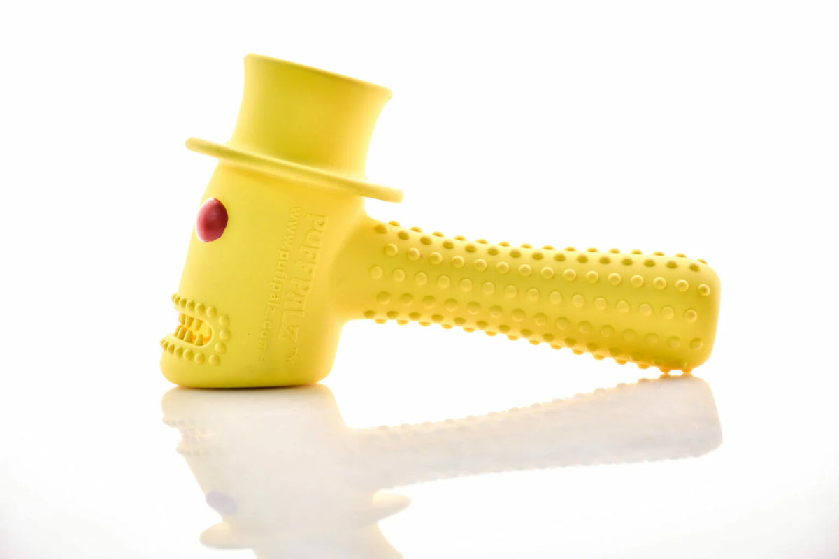 Puff Palz The Hippie Hammer chew toy during outdoor play with a dog