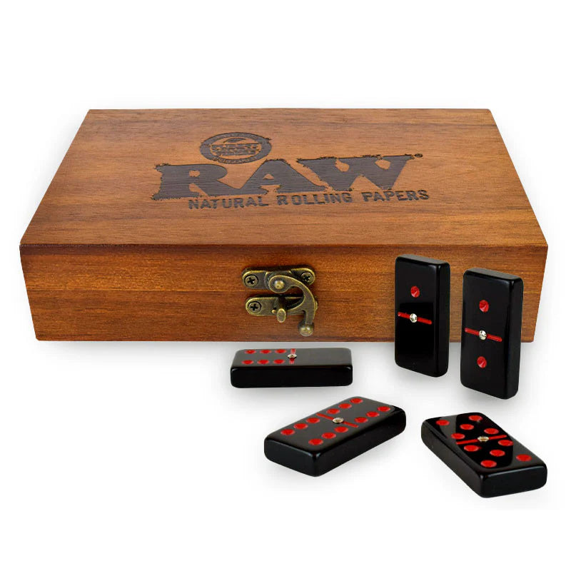 RAW Dominoes tiles laid out showing the engraved RAW logo