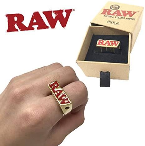 RAW Smoke Ring with bold enamel RAW logo, worn on a finger