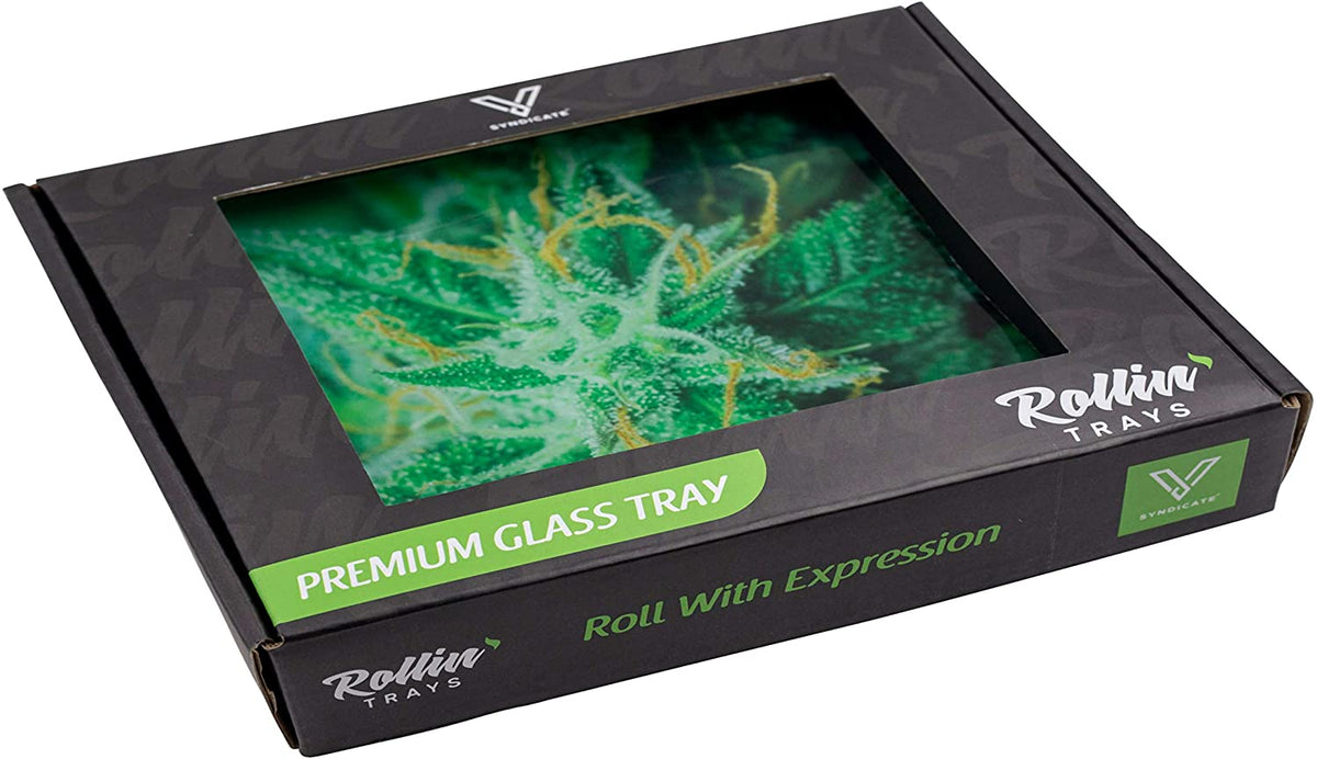 Syndicate Premium Glass Rolling Tray small in use during rolling on a table